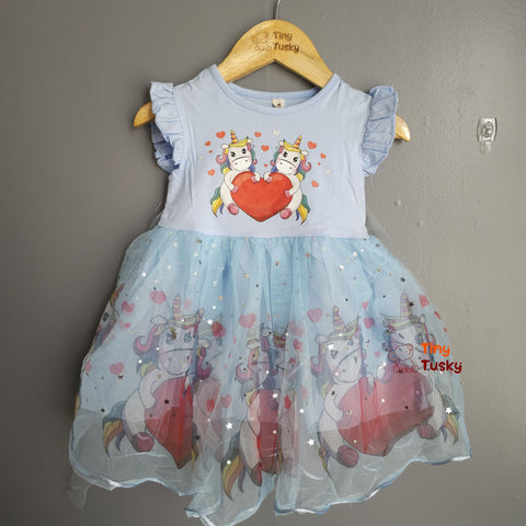 Make playtime magical with the Tiny Tusky Girls Magical Unicorn Casual Dress! This comfortable dress is crafted from a soft, lightweight fabric that's perfect for all-day wear. Featuring a whimsical unicorn print in a delightful pink color, this dress is sure to spark your little one's imagination.

The casual design allows for easy movement and carefree fun, making it a go-to favorite for any occasion. Whether it's a day at the park, a playdate with friends, or a cozy night in, this unicorn dress is sure t